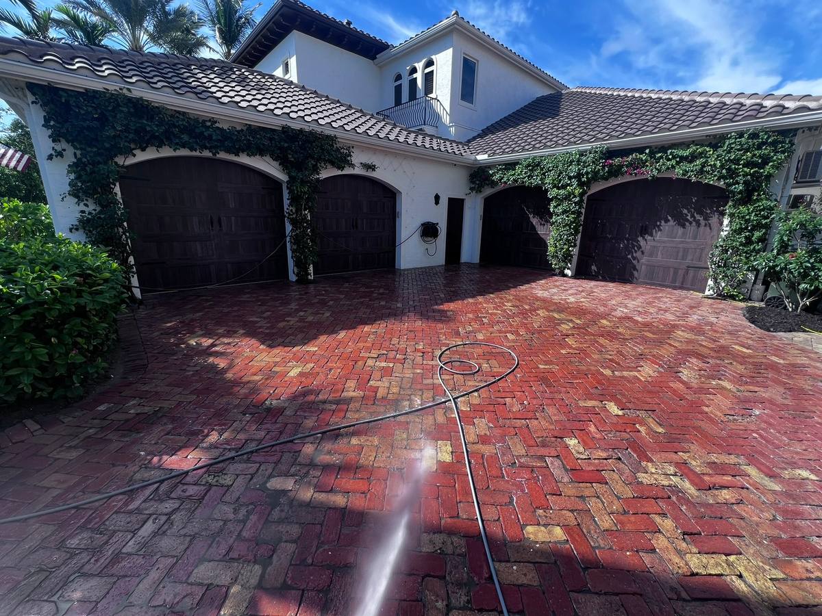 Wet-look brick driveway, Gulf Harbour, Fort Myers: paver cleaning & sealing by Paver Savers & Concrete