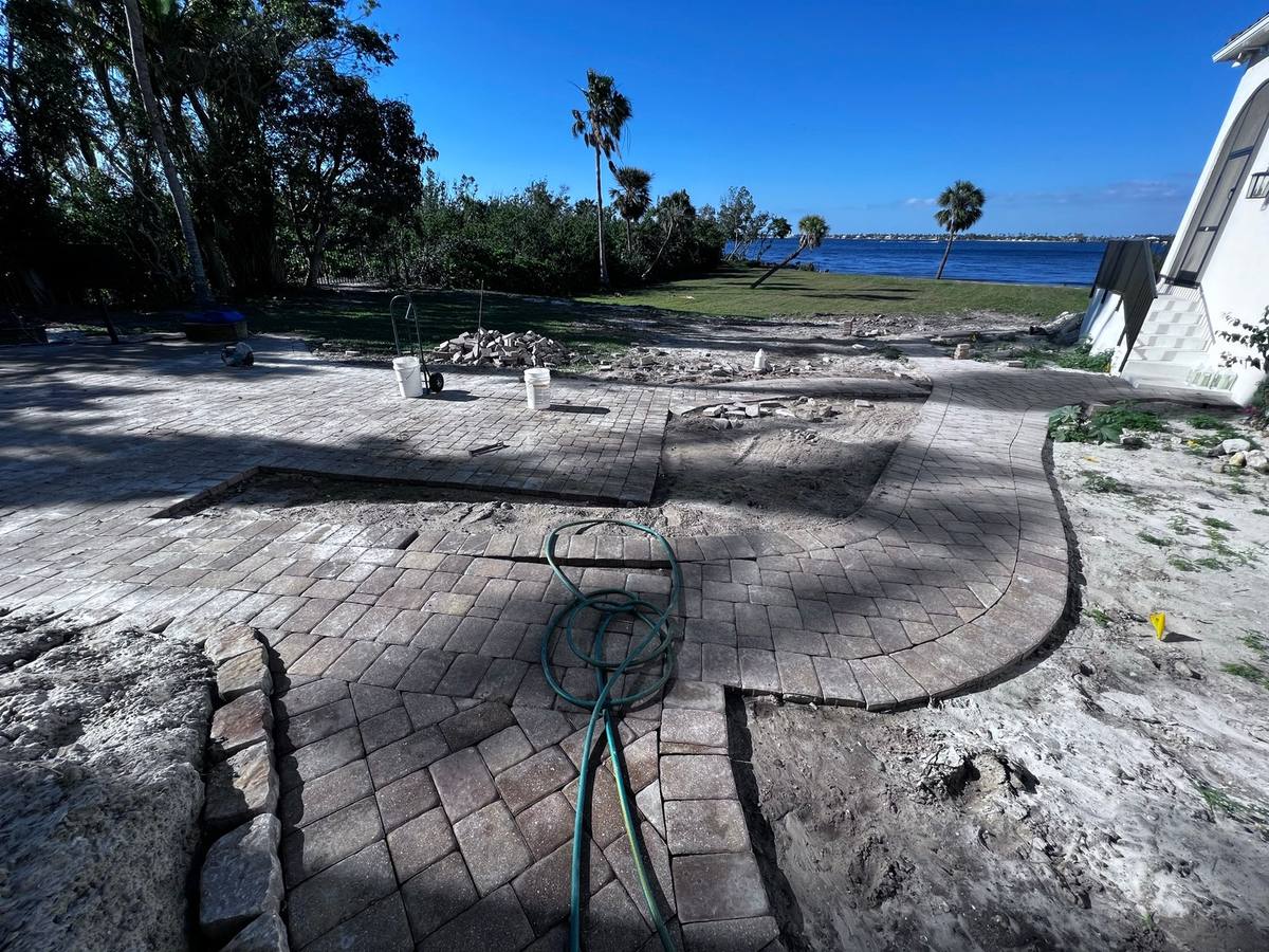 Riverfront patio install, Gulf Harbour: paver installation by Paver Savers & Concrete