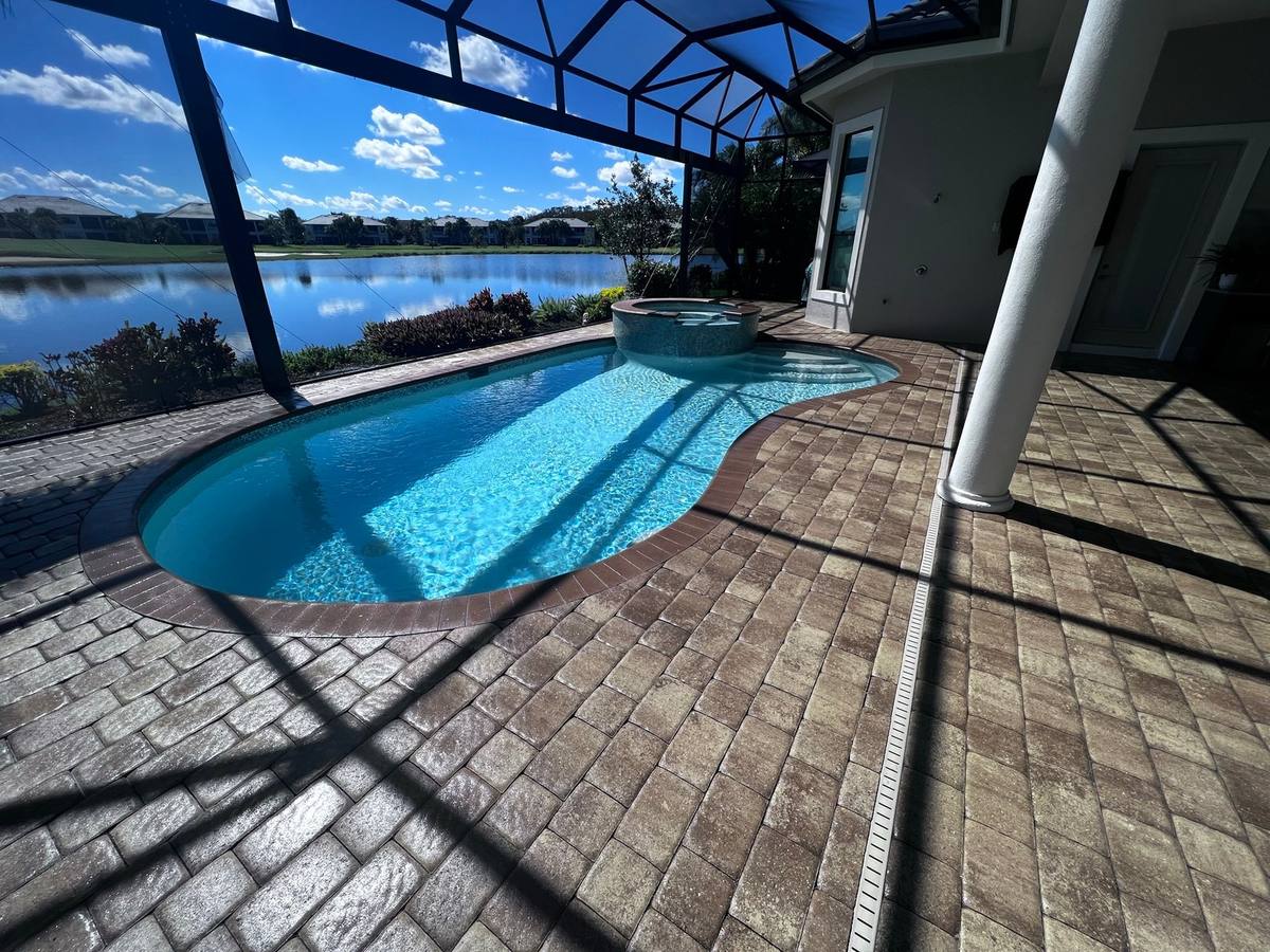 Lakefront lanai sealed: paver cleaning & sealing by Paver Savers & Concrete