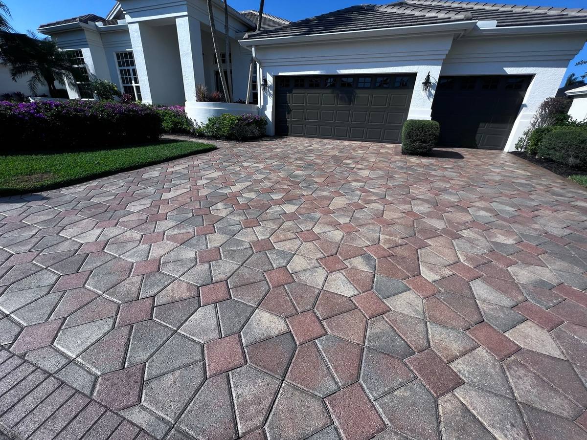 Driveway restored & sealed: paver cleaning & sealing by Paver Savers & Concrete