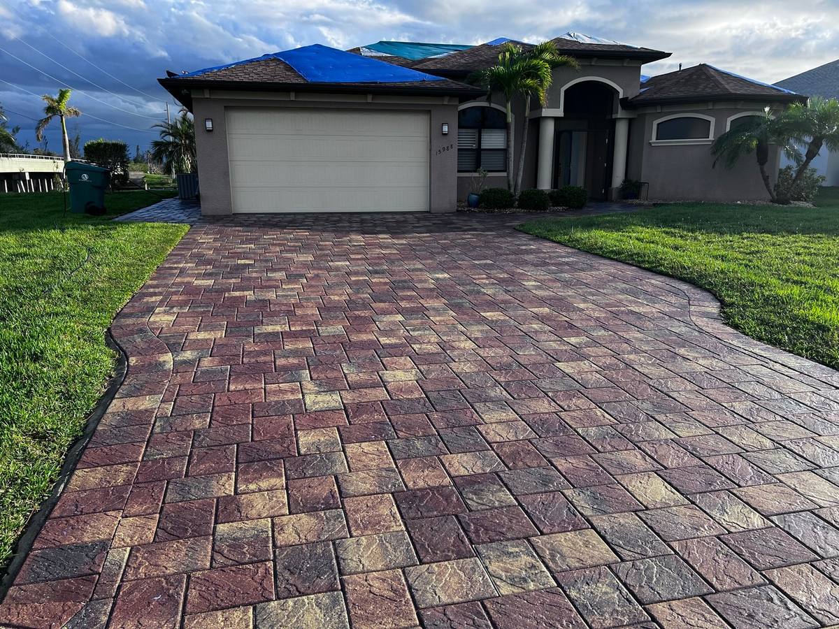 Freshly sealed paver driveway at a Punta Gorda home
