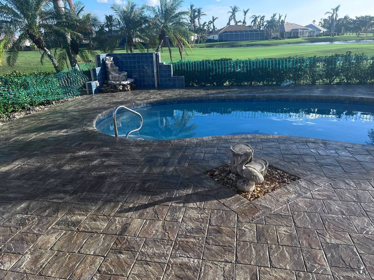 Pool deck on the golf course: paver cleaning & sealing by Paver Savers & Concrete